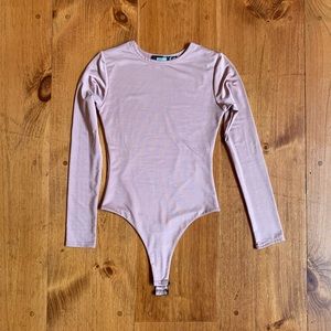 Light pink sheen body suit